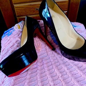 Size 38 1/2/8 1/2 very gently used Christian Louboutin black platform, 4 in.